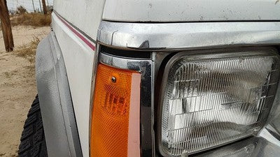 1991-1996 Jeep Cherokee Passenger Right Chrome Trim Around Headlight Oem