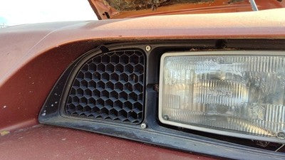 1985-1987 Pontiac Sunbird Driver Left Headlight Trim Bezel Oem Surround Door