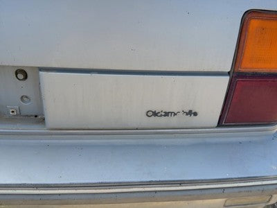 1986 Olds 88 License Plate Trim Surround Panel Oem Tail Trunk Finish Silver