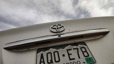 2005 Camry License Plate Trim Surround Panel Tail Trunk 1C8 Lunar Mist Metallic