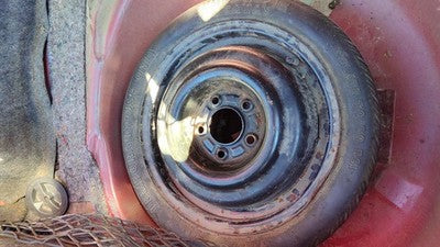 1988-1994 Grand Prix Compact Spare Donut Wheel And Tire Oem 09591237