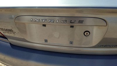 2000 Oldsmobile Intrigue License Plate Trim Surround Panel Tail Trunk Silver 17U