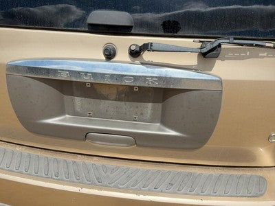 04-05 Rainier License Plate Trim Surround Panel Tail Trunk Finish Cashmere 15U