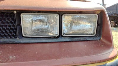 1985-1988 Pontiac Sunbird Driver Left Head Light Oem Front Lamp 10026819