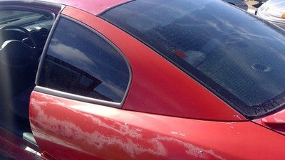 2003 Pontiac Sunfire Driver Left Rear Moulding On Quarter Panel Red Upper Corner