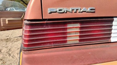 1985-1987 Pontiac Sunbird Driver Left Tail Light Brake Lamp Oem Rear Crack