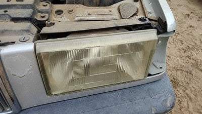 1990-1992 Volvo 740 Driver Left Head Light Oem Front Lamp With Bracket 13696034