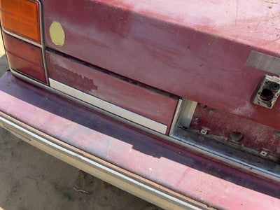 1986-1989 Olds 88 License Plate Trim Surround Panel Oem Tail Trunk Finish