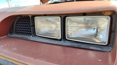 1985-1987 Pontiac Sunbird Driver Left Headlight Trim Bezel Oem Surround Door