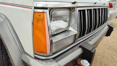 1991-1996 Jeep Cherokee Passenger Right Chrome Trim Around Headlight Oem