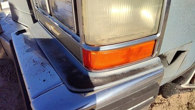 80-84 Deville Sedan Driver Left Below Headlamp Bumper Filler Front Blue Moulding