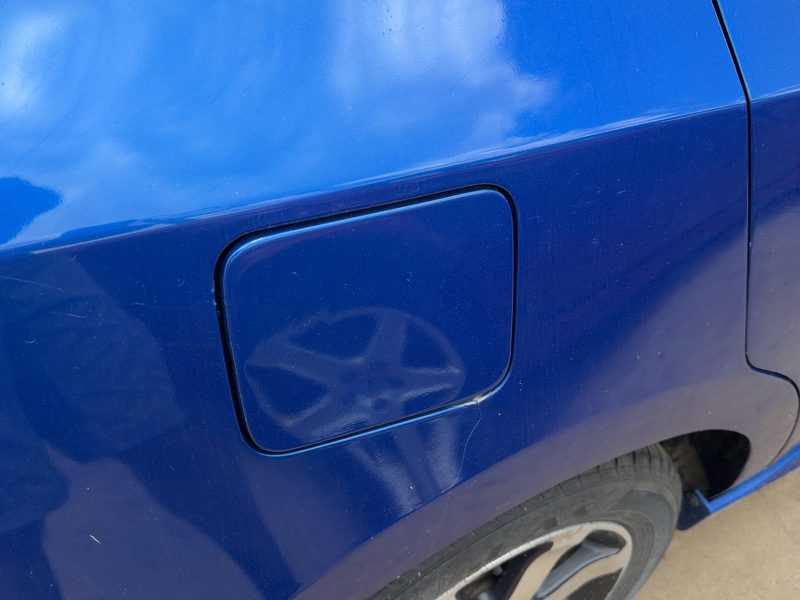 2007-2012 Nissan Sentra Fuel Tank Door