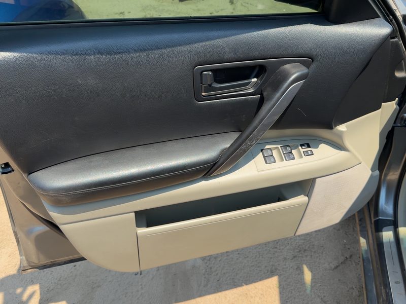 2003-2006 Infiniti FX Series Front Door Trim Panel LH