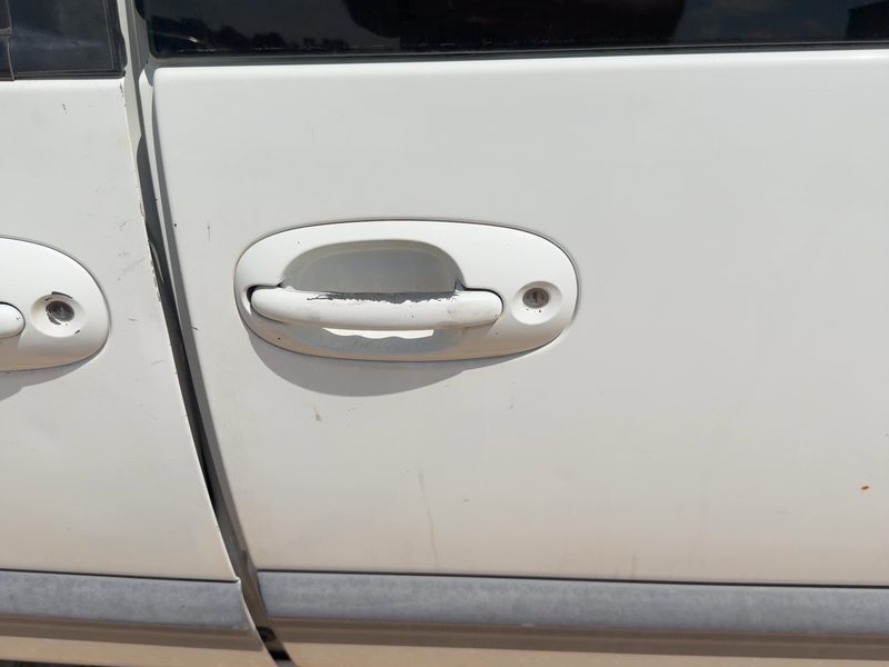 1999 Chrysler Town & Country Outside Door Handle LH