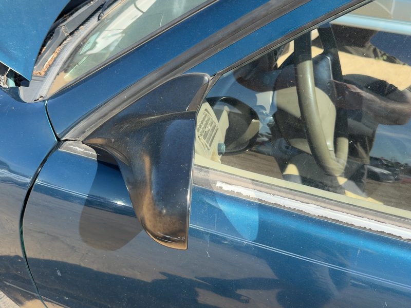 1998-2002 Toyota Corolla (also See FX 87-88) Door Mirror LH