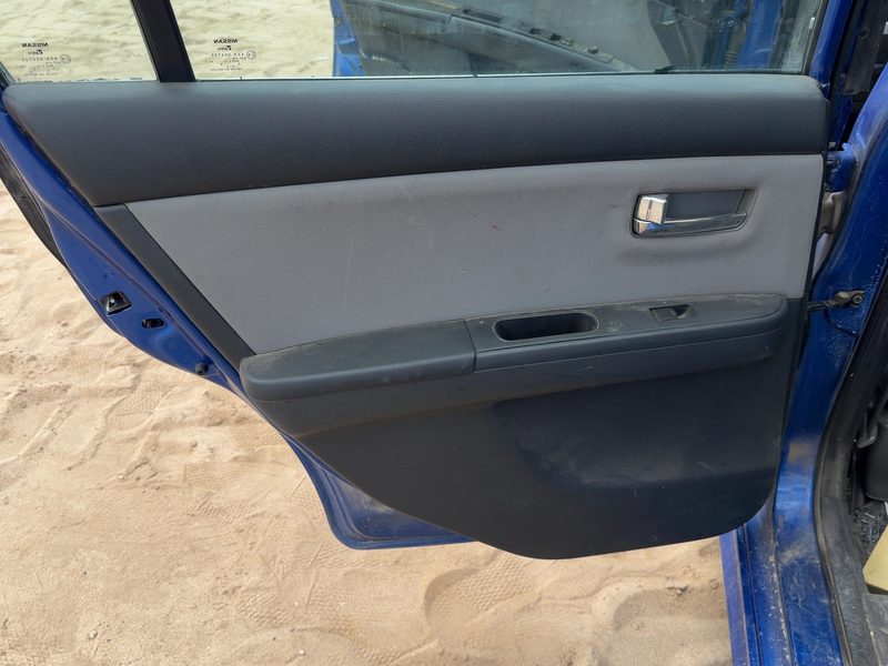 2011-2012 Nissan Sentra Rear Door Trim Panel LH