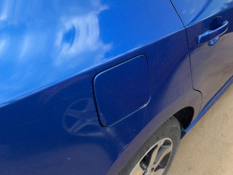 2007-2012 Nissan Sentra Fuel Tank Door