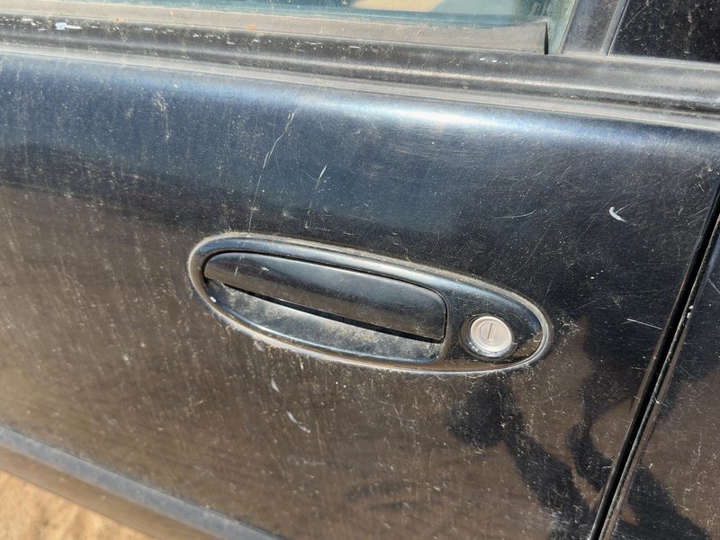 1996 Nissan Maxima Outside Door Handle LH