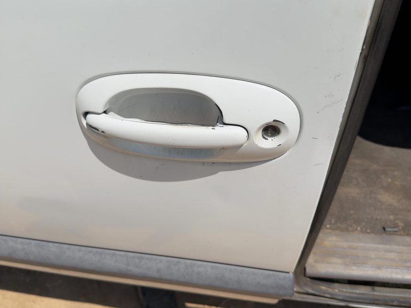 1999 Chrysler Town & Country Outside Door Handle LH